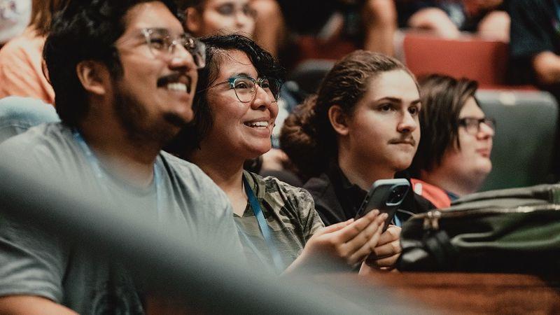 Students sitting in auditorium